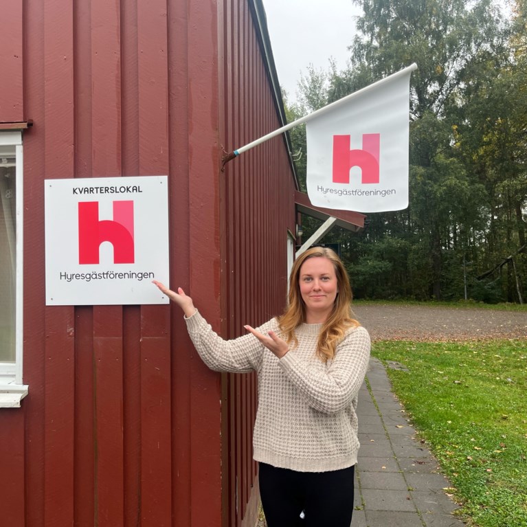 Kvinna vid kvarterslokal