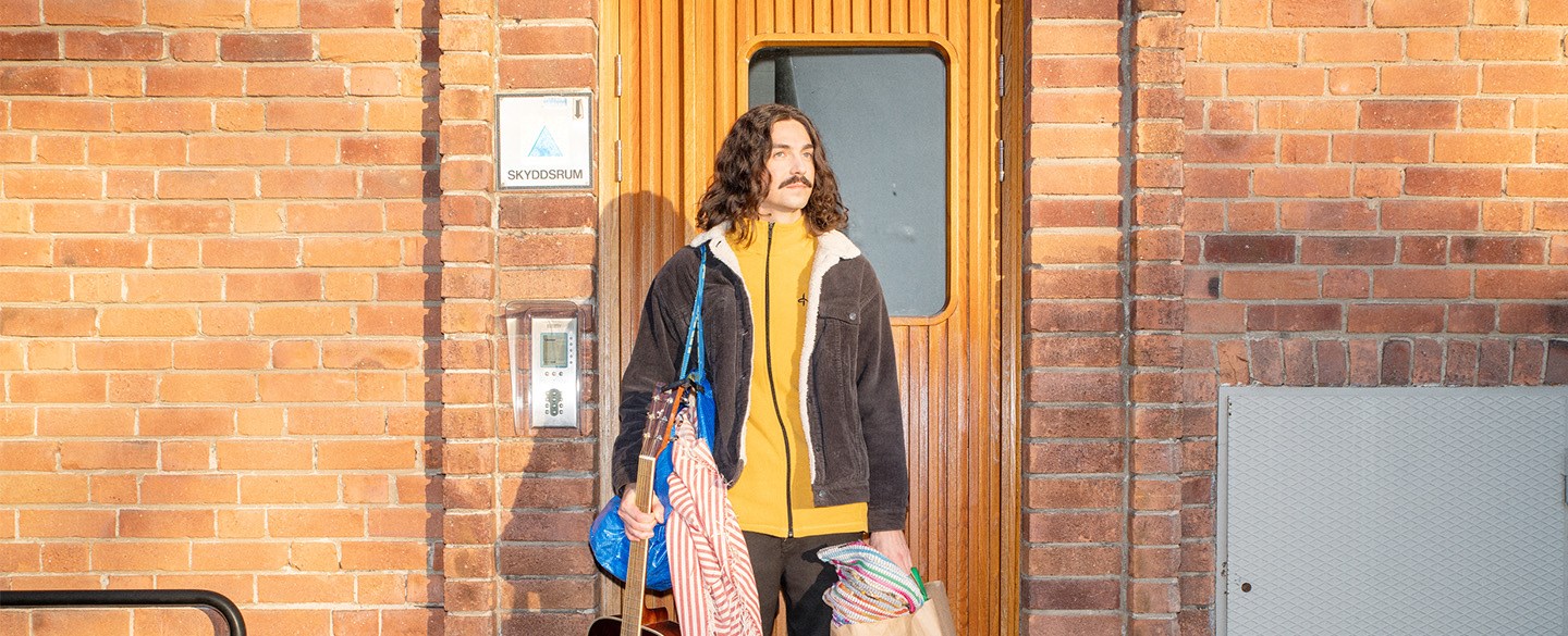 man_entre_gitarr_flytta